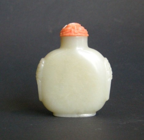 snuff bottle  pale celadon jade  - mask on the side  - 1750/1850 -